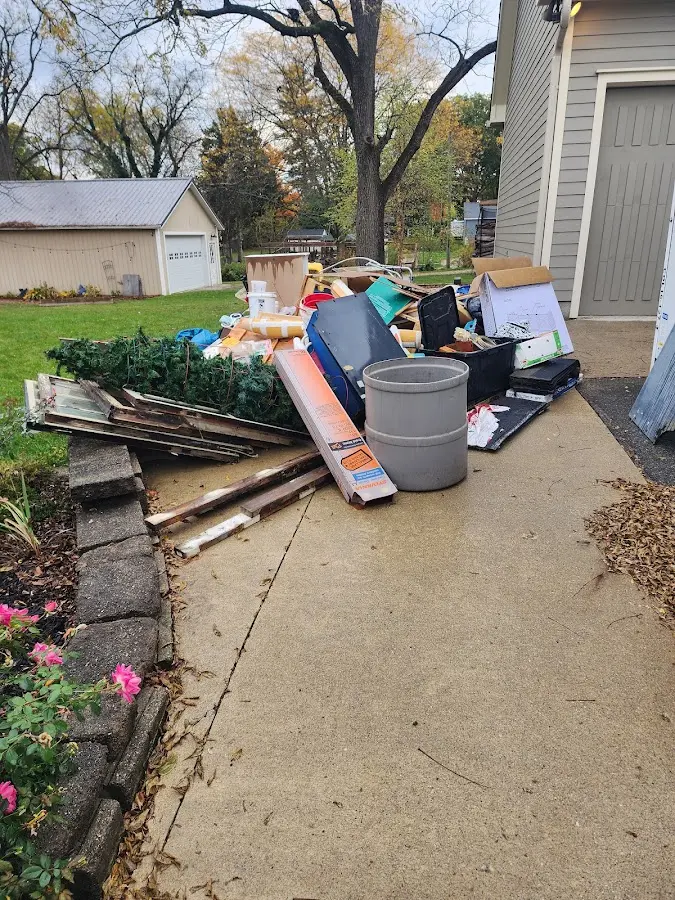 Dumpster being loaded with debris for 3 Yard Dumpster Rental in Altadena